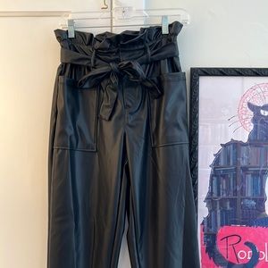 Never been worn Who What Wear faux leather pants. Size 2